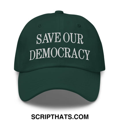 Dark green unstructured dad hat with white embroidered text save our democracy in a casual cotton style