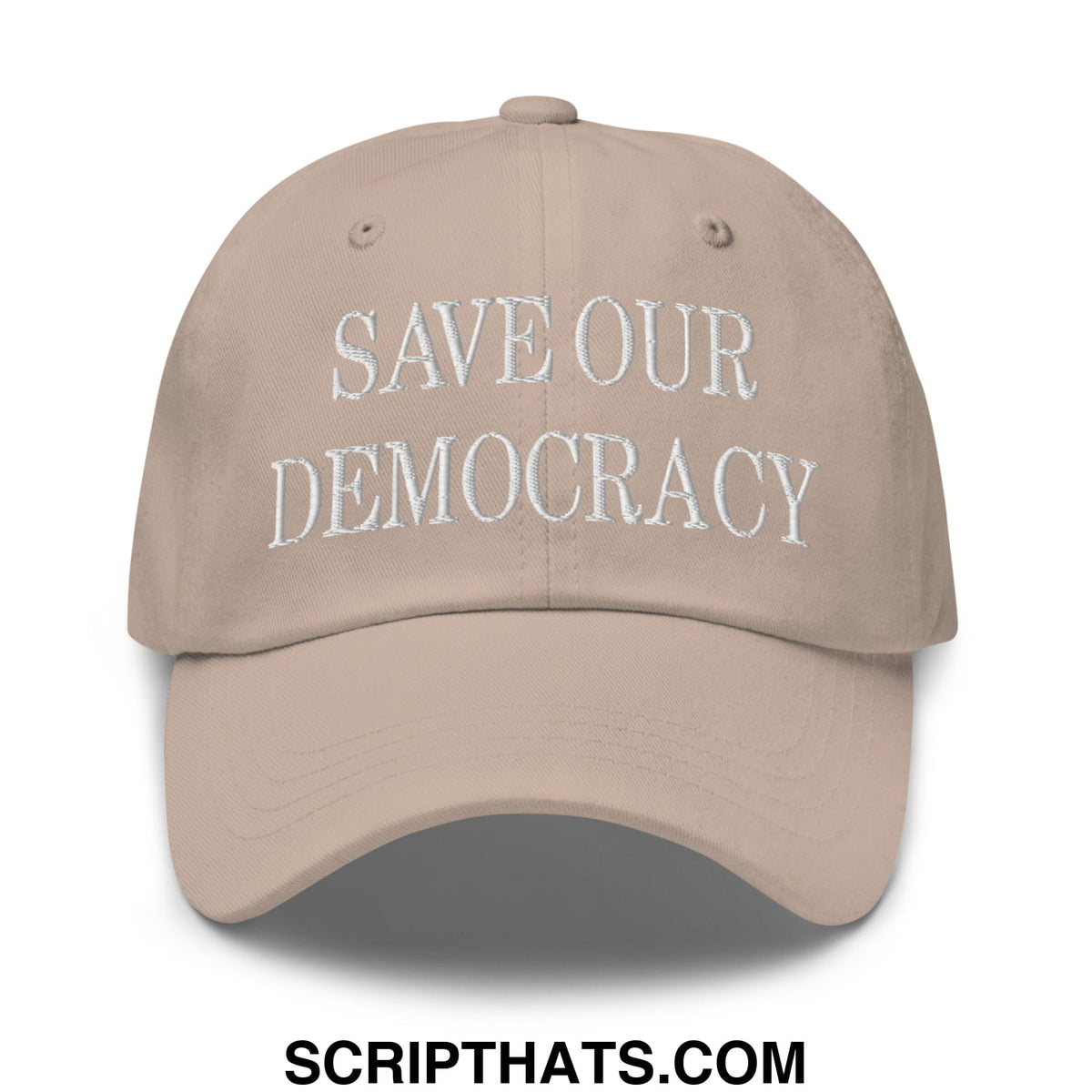 Beige unstructured dad hat with white embroidered save our democracy text made from cotton blend material