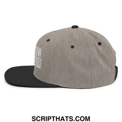 Gray and black snapback hat with heathered fabric crown flat bill and white embroidered shit show supervisor text on side