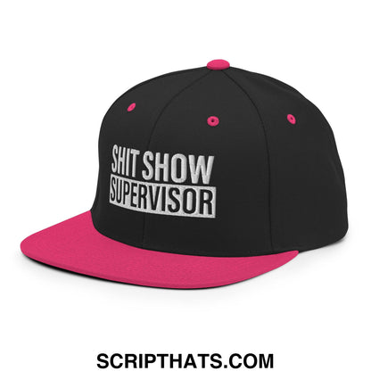 Black snapback cap with vibrant pink brim and button featuring white embroidered shit show supervisor text