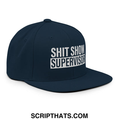 Navy blue snapback hat with white embroidered shit show supervisor text and flat bill brim