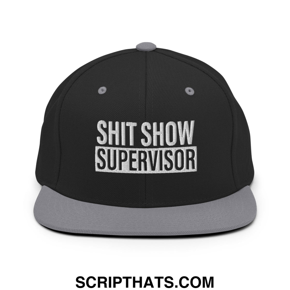 Black snapback hat with gray flat bill brim and embroidered white shit show supervisor text on front