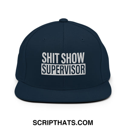 Navy blue snapback hat with white embroidered shit show supervisor text and flat bill brim made of durable fabric