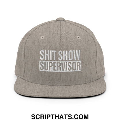 Gray heather snapback cap with white embroidered shit show supervisor text and flat bill brim design