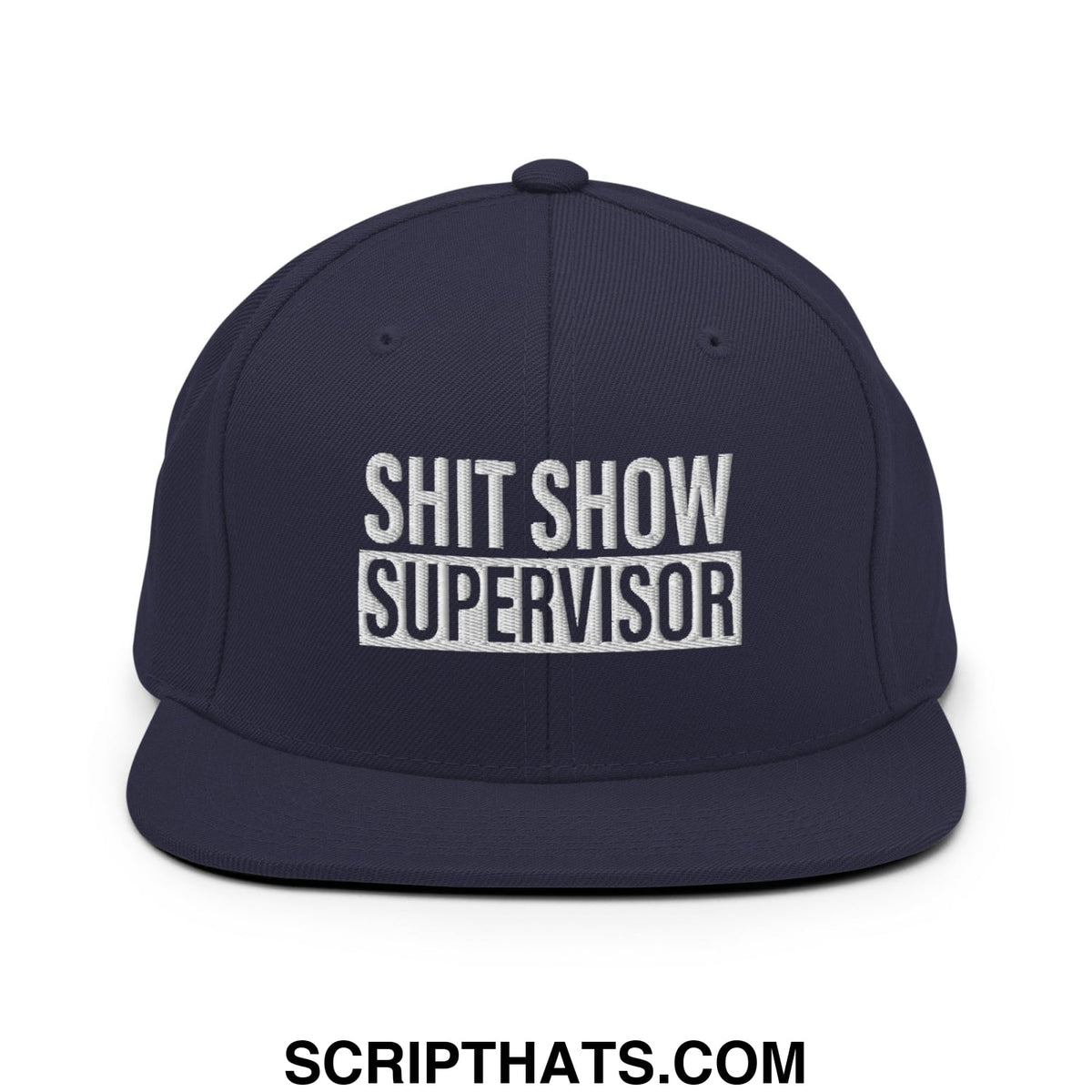 Navy blue snapback hat with white embroidered shit show supervisor text and flat bill brim design