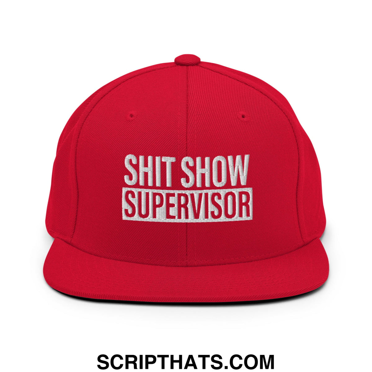 Red snapback cap with a flat bill and white embroidered shit show supervisor text in bold block letters