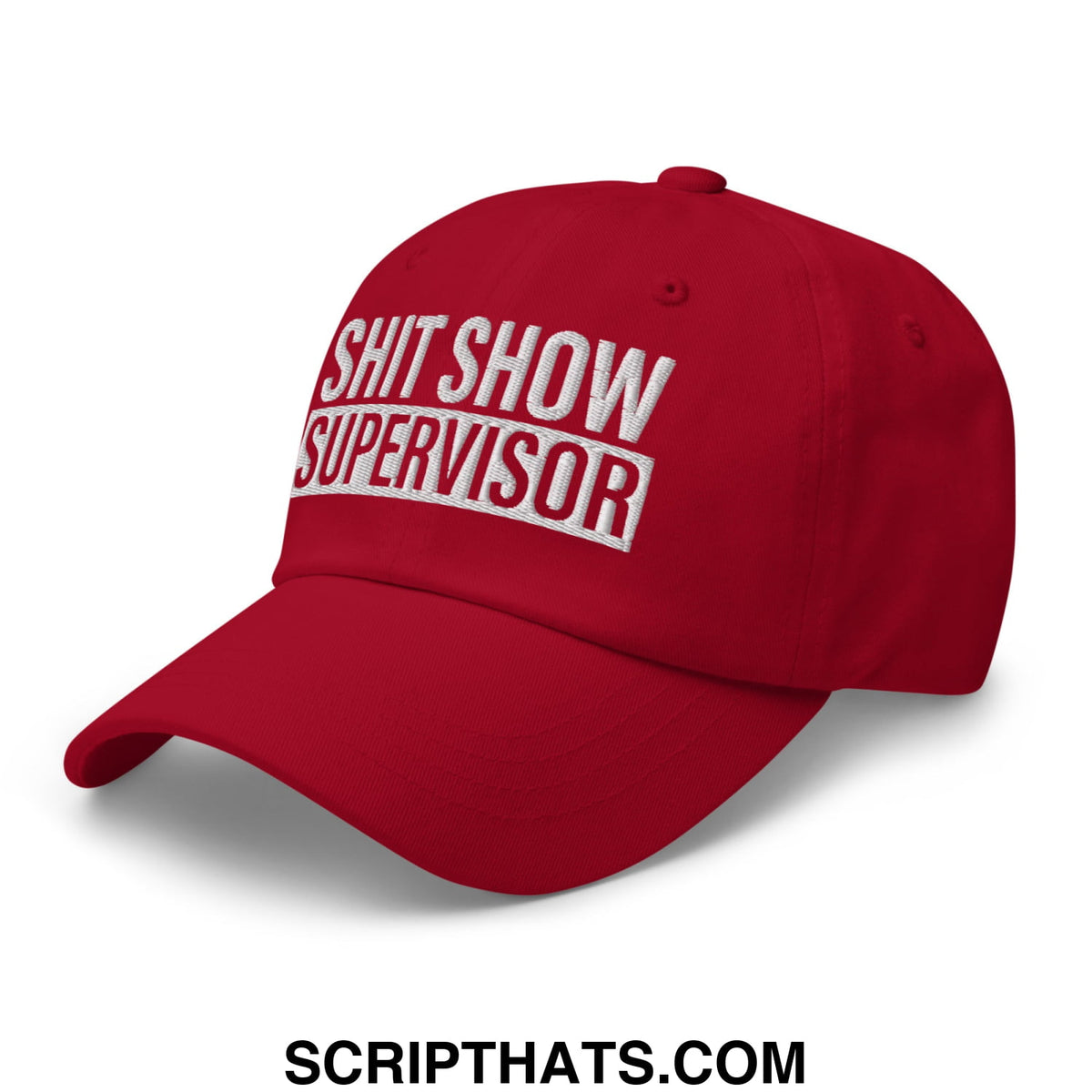Red unstructured dad hat with white embroidered text reading shit show supervisor for casual wear