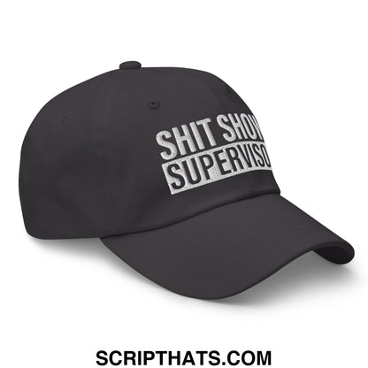 Black embroidered unstructured dad hat with bold white shit show supervisor text for casual wear