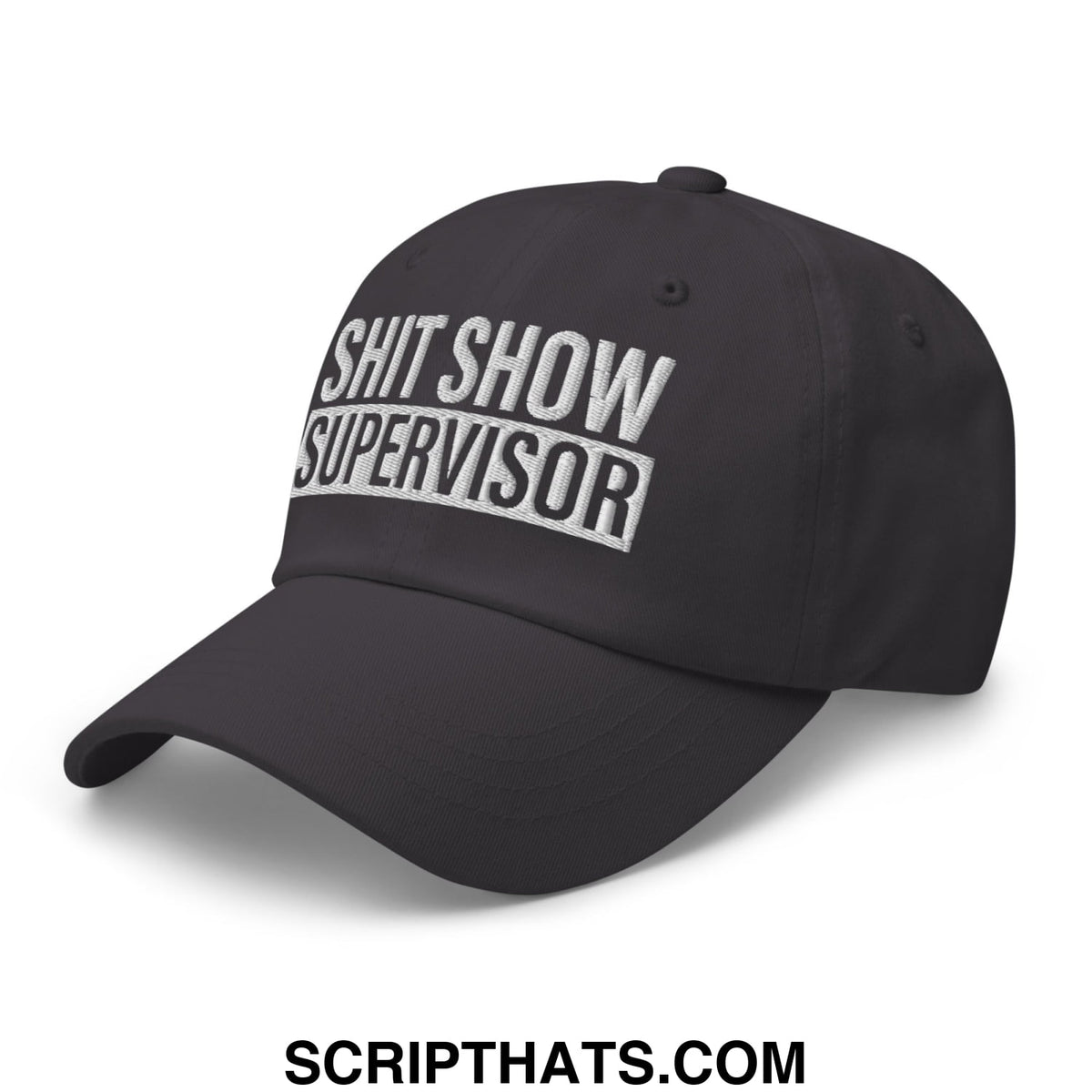 Black unstructured dad hat with shit show supervisor embroidered in white thread on the front