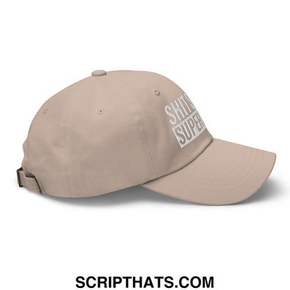 Beige unstructured dad hat with white embroidered text reading shits super from shit show supervisor collection