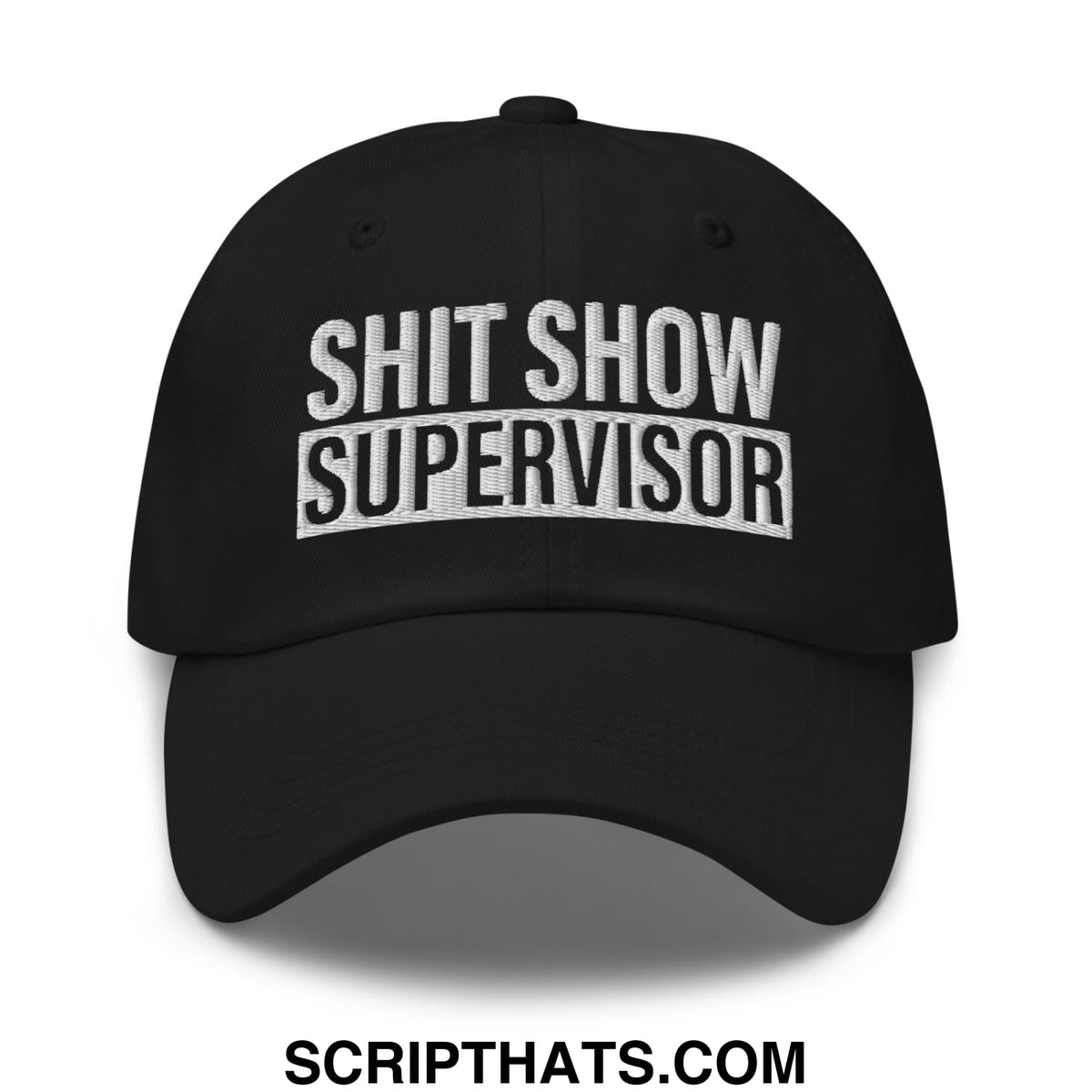 Black unstructured dad hat with white embroidered shit show supervisor text in bold block letters