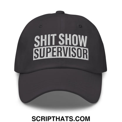 Black unstructured dad hat with white embroidered bold shit show supervisor text on the front