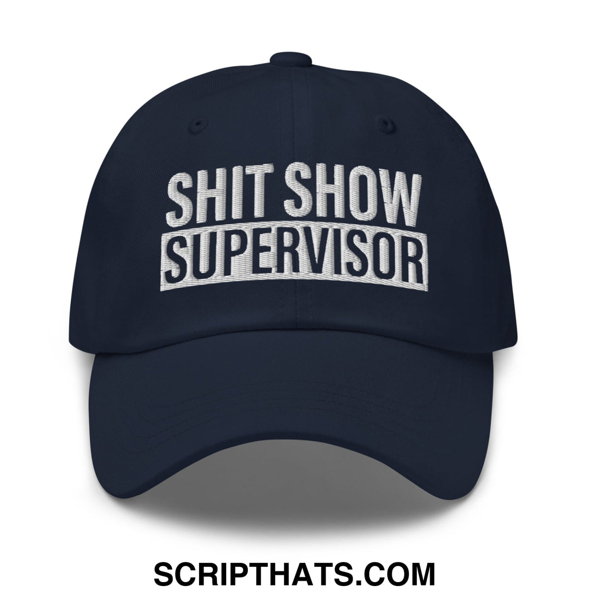 Navy blue unstructured dad hat with white embroidered bold text shit show supervisor on front panel