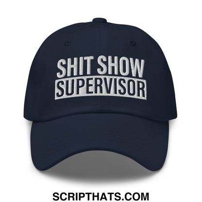 Navy blue unstructured dad hat with white embroidered bold text shit show supervisor on front panel