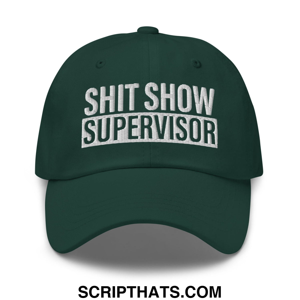 Dark green unstructured dad hat with white embroidered text reading shit show supervisor in bold block letters