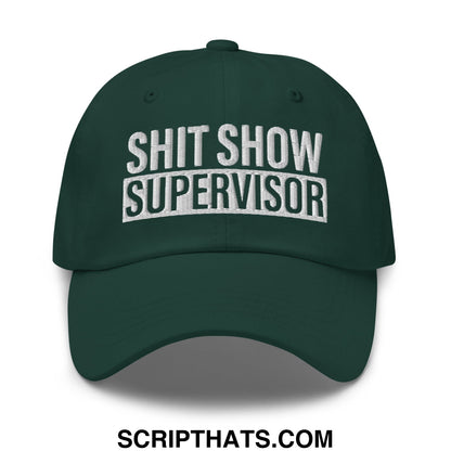 Dark green unstructured dad hat with white embroidered text reading shit show supervisor in bold block letters