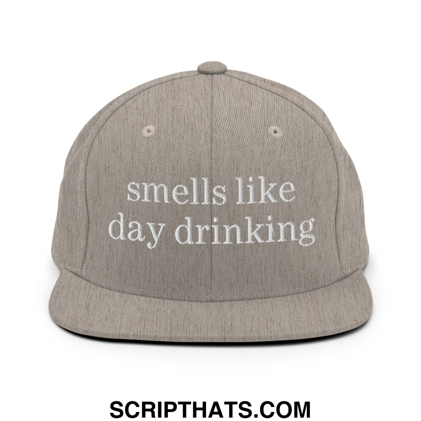 Gray snapback hat with white embroidered text reading smells like day drinking flat bill brim design