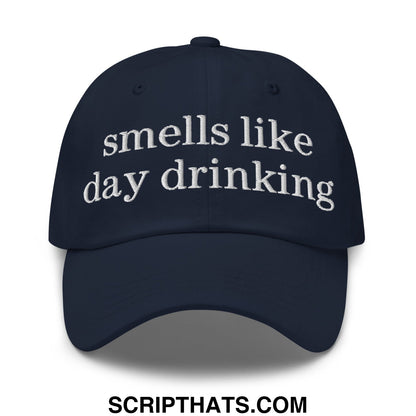 Navy blue unstructured dad hat with white embroidered text reads smells like day drinking for casual wear