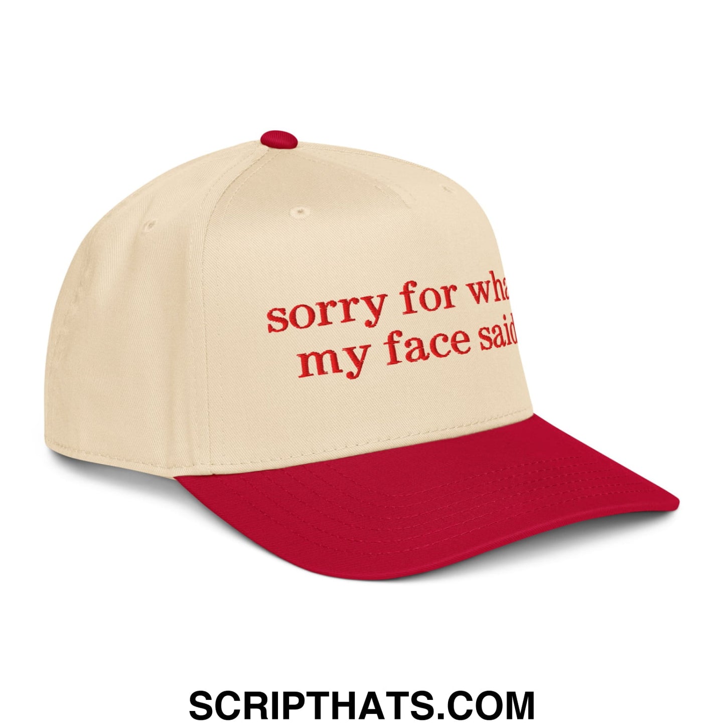 Beige and red baseball snapback hat with embroidered Sorry For What My Face Said text in matching red thread