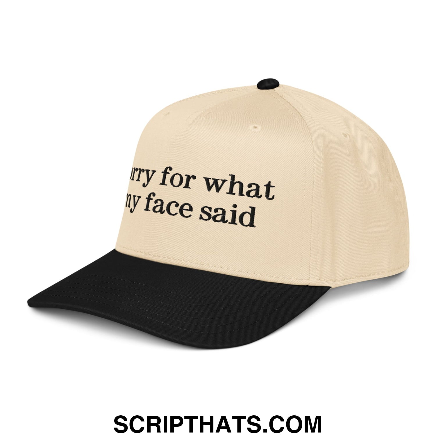 Beige and black embroidered baseball snapback hat with bold sorry for what my face said phrase on front panel