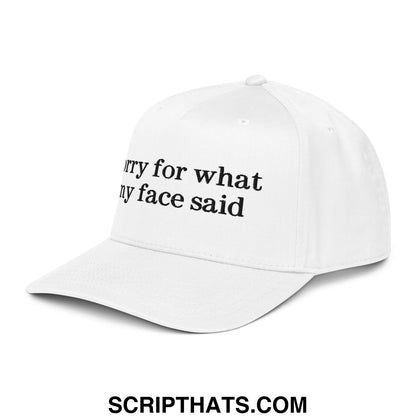 White embroidered cotton baseball snapback hat with black text reading sorry for what my face said
