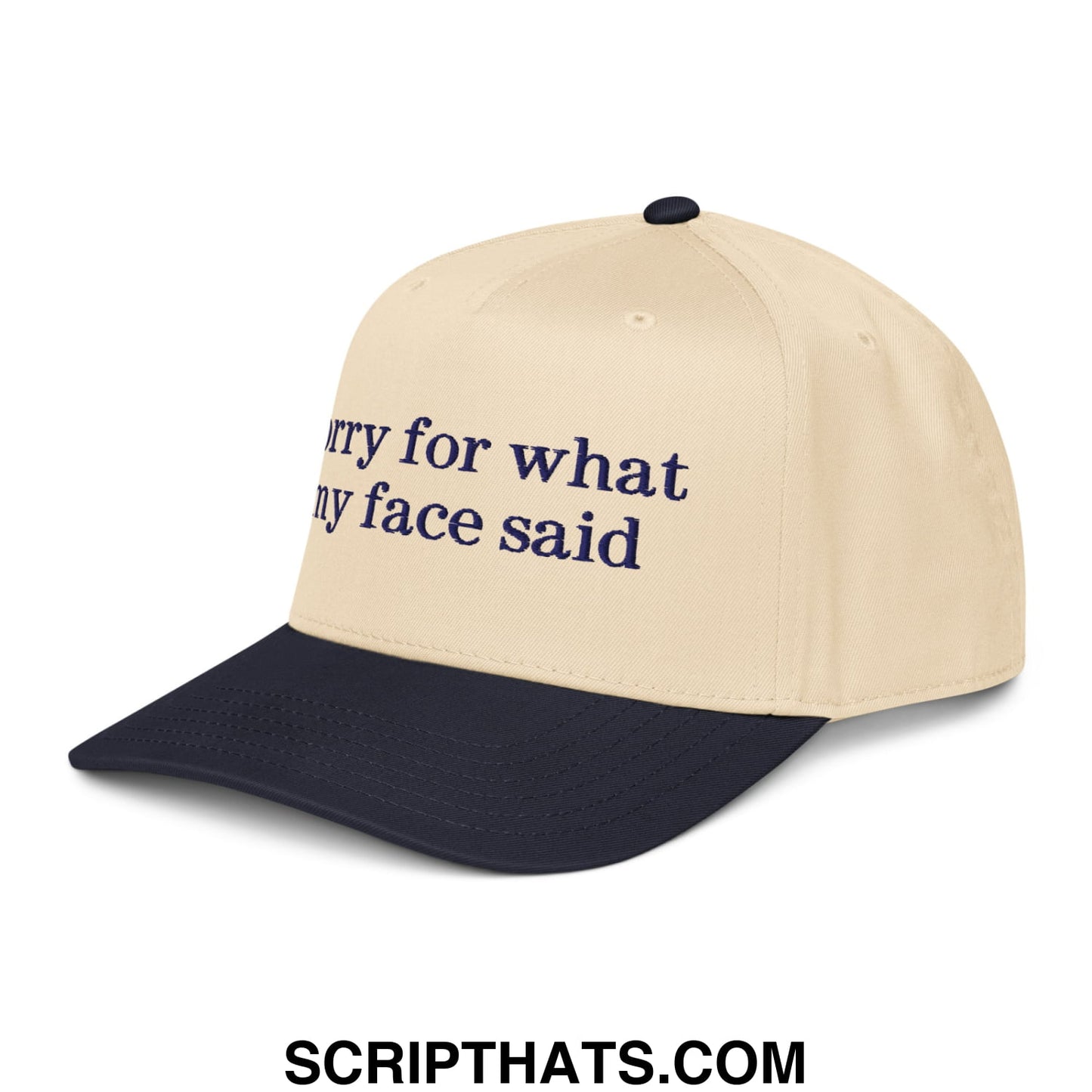 Beige and navy blue two-tone baseball snapback hat with embroidered text sorry for what my face said