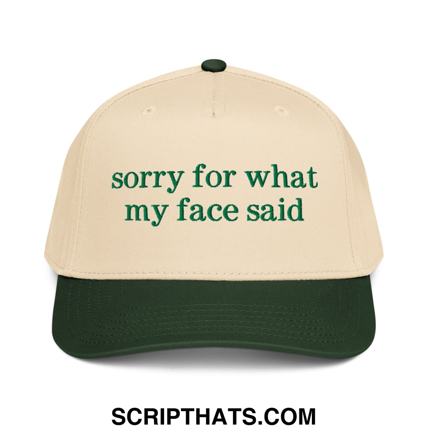 Beige and dark green baseball snapback hat with embroidered sorry for what my face said text in matching green font