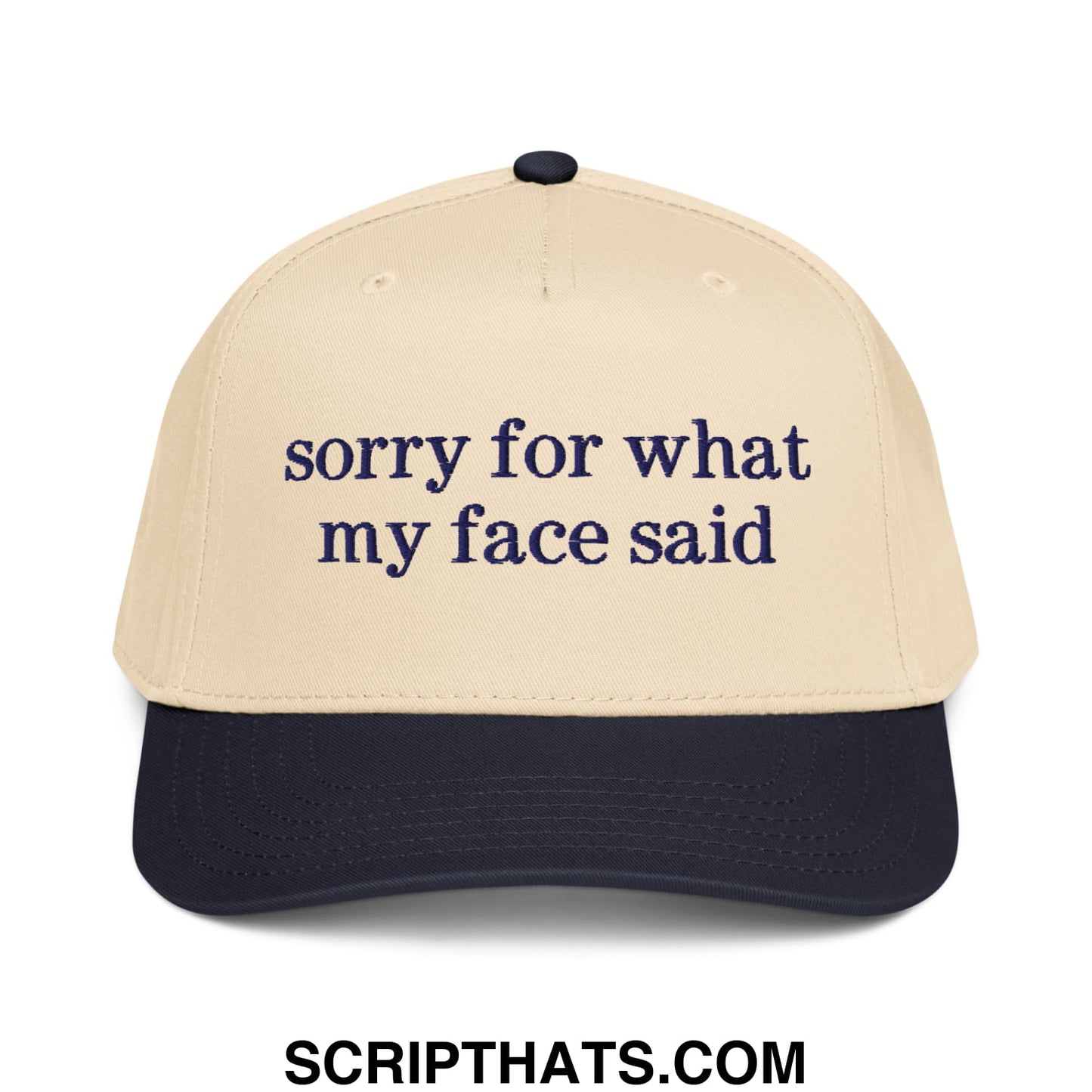 Beige and navy blue embroidered baseball snapback hat with sorry for what my face said text on front panel