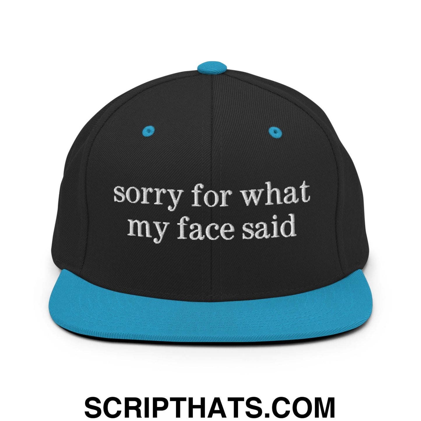 Black snapback cap with teal brim and button featuring white embroidered sorry for what my face said text