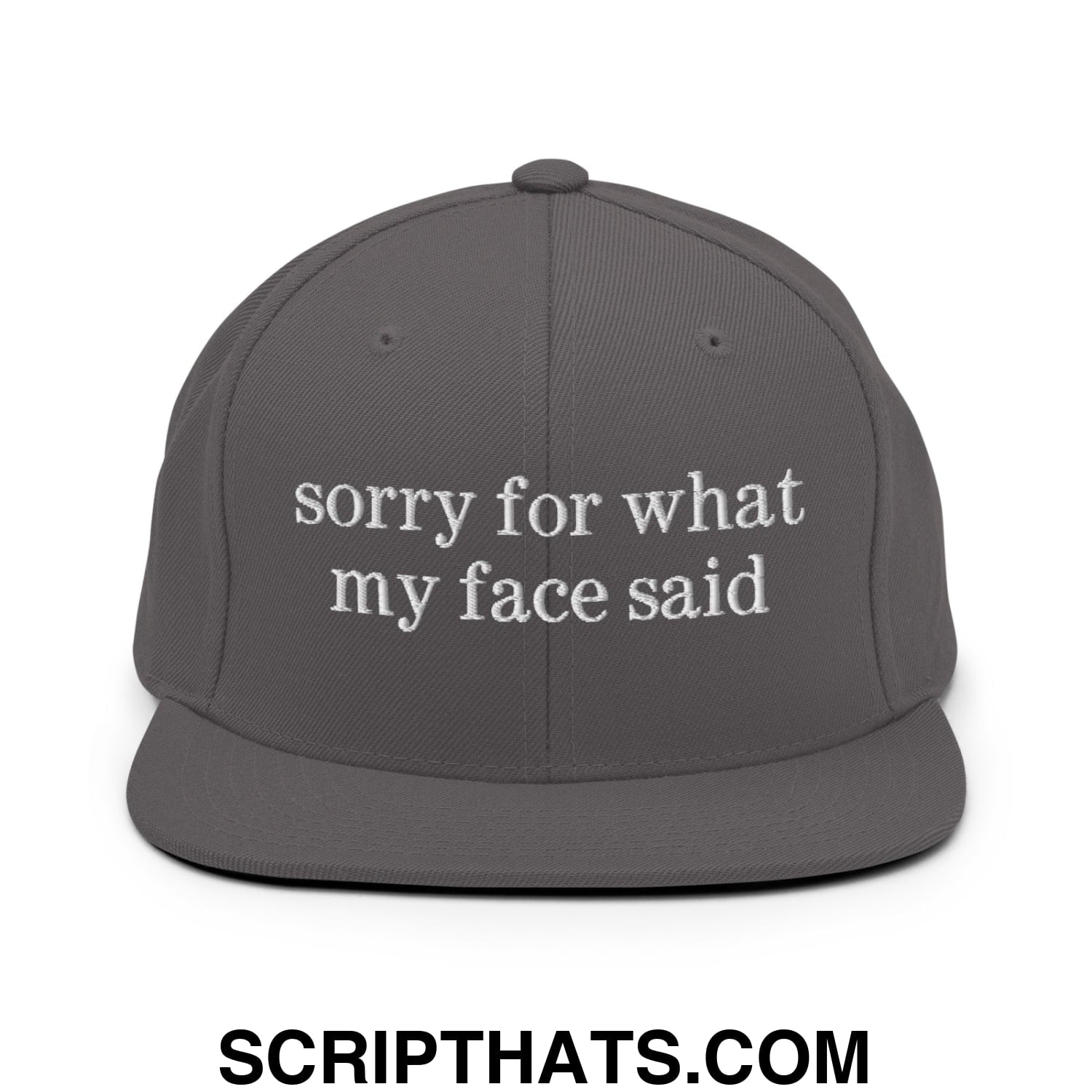 Dark gray flat bill snapback hat with white embroidered sorry for what my face said text on the front