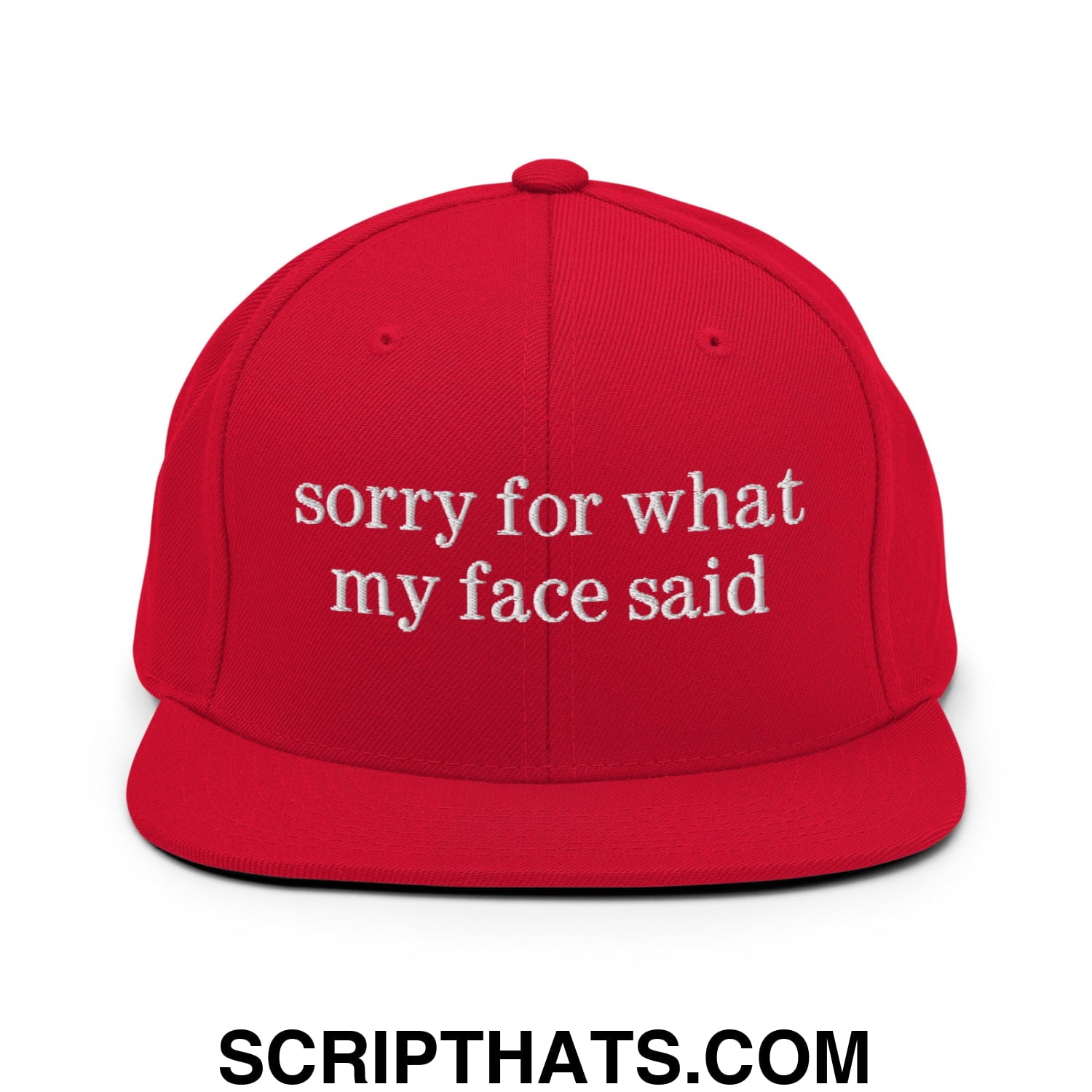 Red snapback hat with white embroidered sorry for what my face said text and flat bill brim design