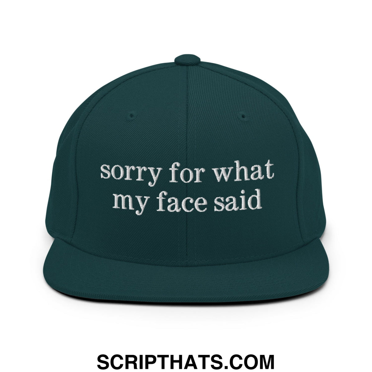 Dark green snapback hat with white embroidered sorry for what my face said text and flat bill brim design