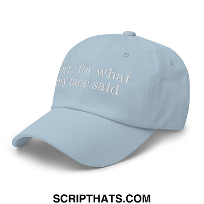 Light blue unstructured dad hat with white embroidered sorry for what my face said text perfect for casual wear