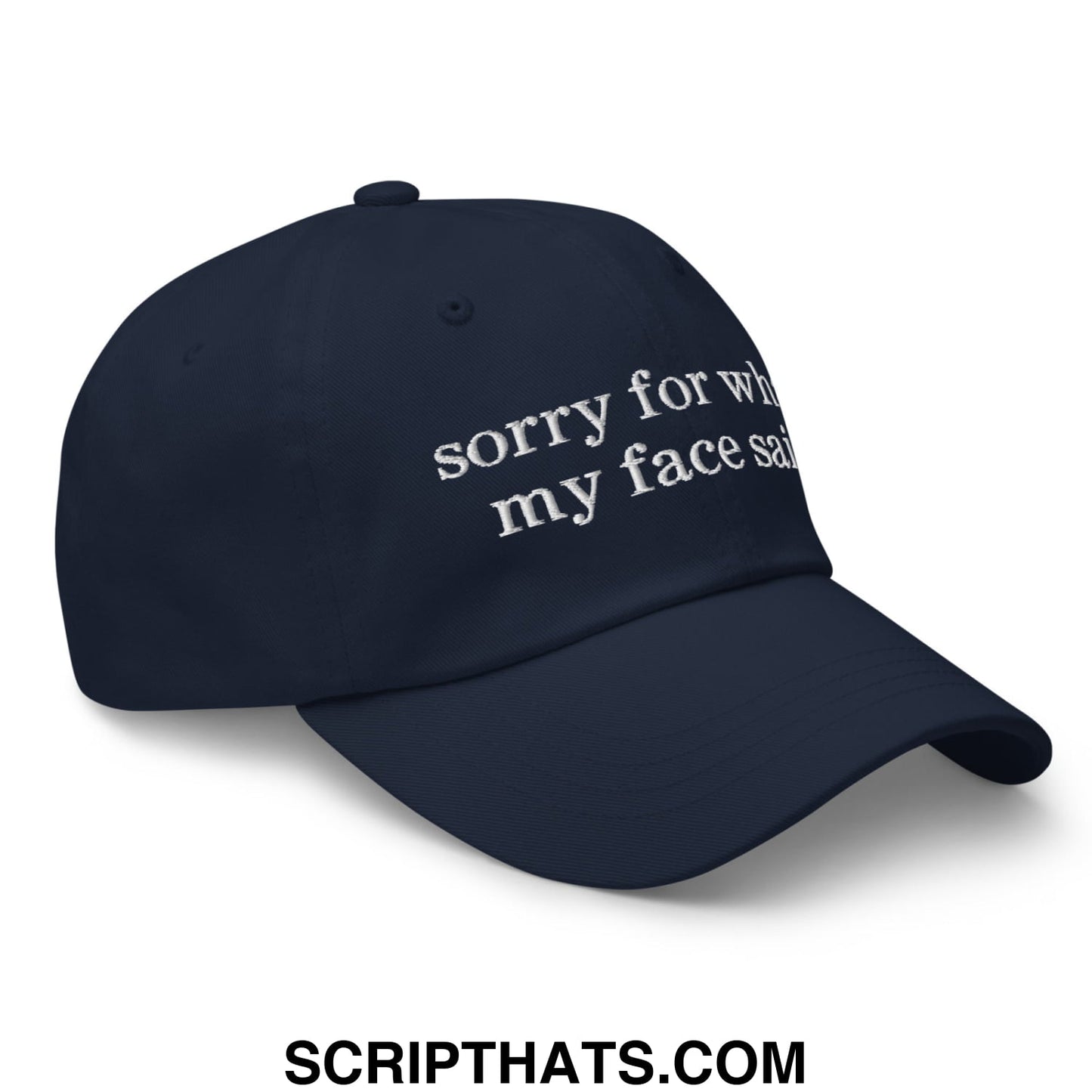 Navy blue embroidered unstructured dad hat with white sorry for what my face said text on front