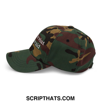 A camouflage-patterned unstructured dad hat with white embroidered sorry for what my face said text on the side