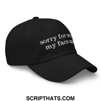 Black unstructured dad hat with white embroidered sorry for what my face said text on the front panel