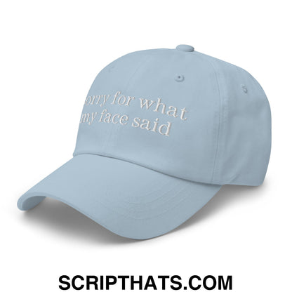 Light blue unstructured dad hat with white embroidered sorry for what my face said text perfect for casual wear