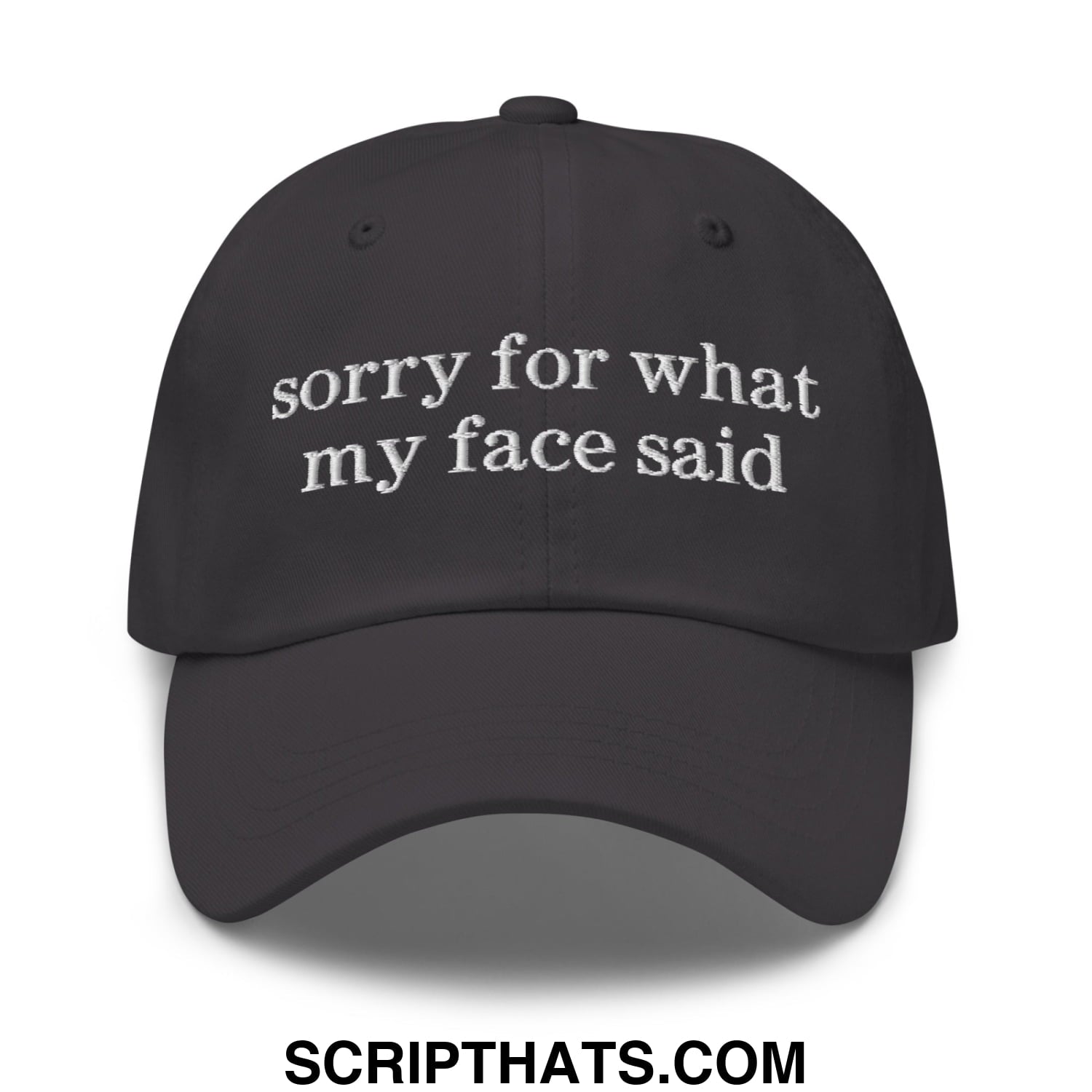 Black embroidered sorry for what my face said text on an unstructured dad hat baseball cap