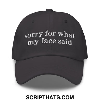 Black embroidered sorry for what my face said text on an unstructured dad hat baseball cap