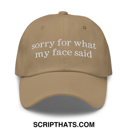 Tan unstructured dad hat with white embroidered sorry for what my face said text on the front