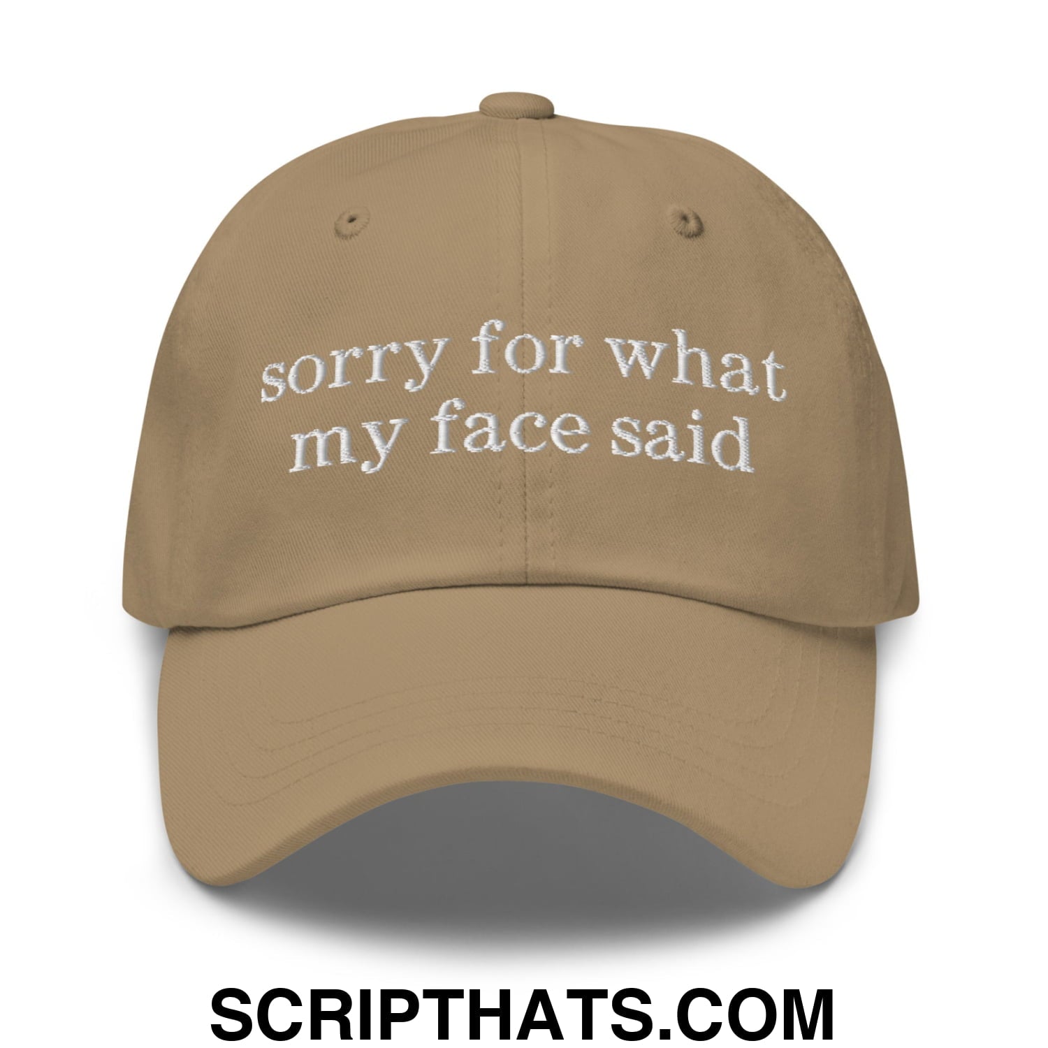 Tan unstructured dad hat with white embroidered sorry for what my face said text on the front