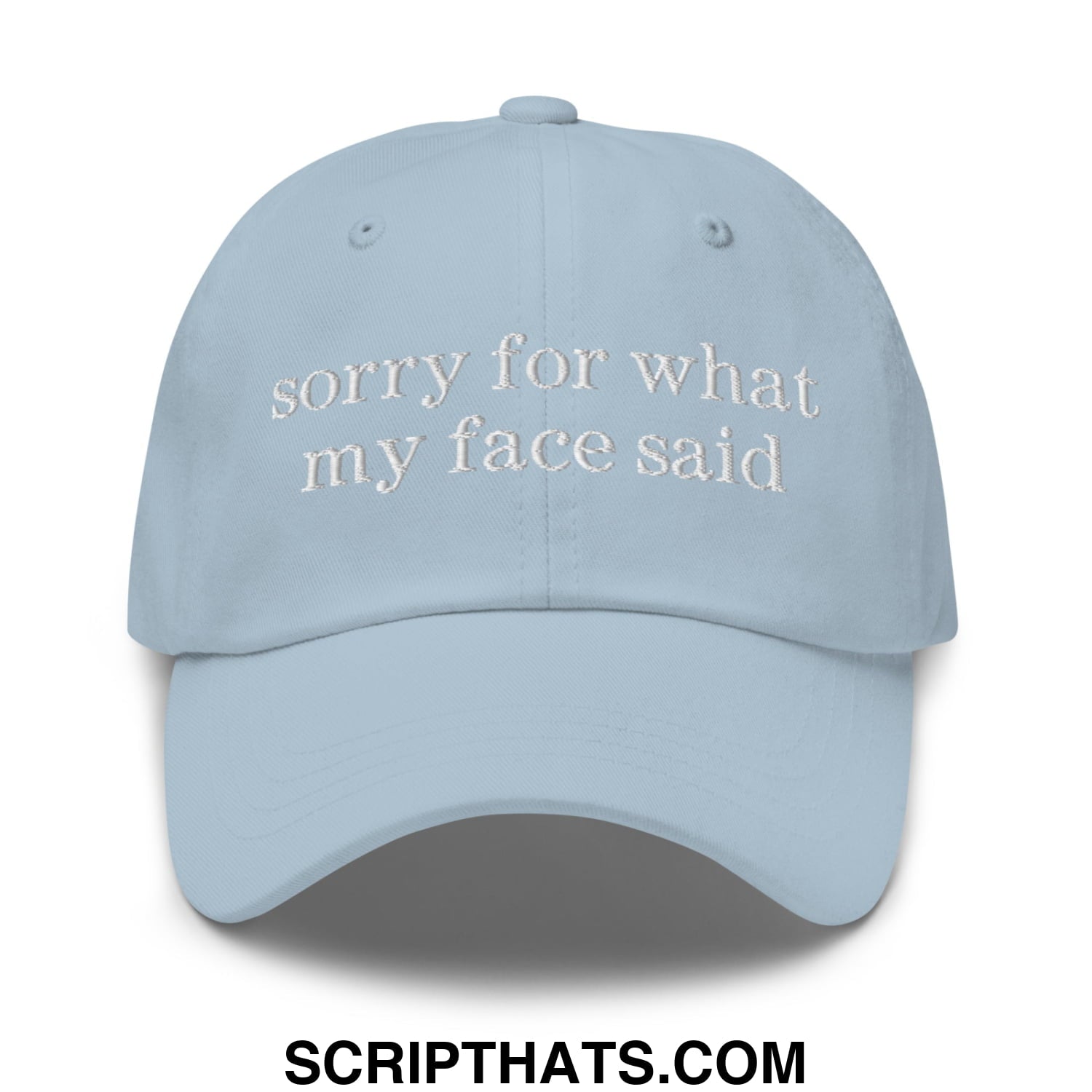 Light blue embroidered unstructured dad hat with white text sorry for what my face said for casual wear
