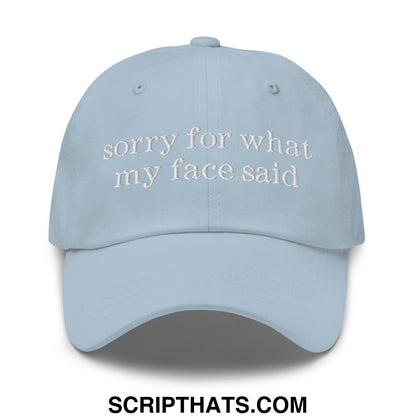 Light blue embroidered unstructured dad hat with white text sorry for what my face said for casual wear
