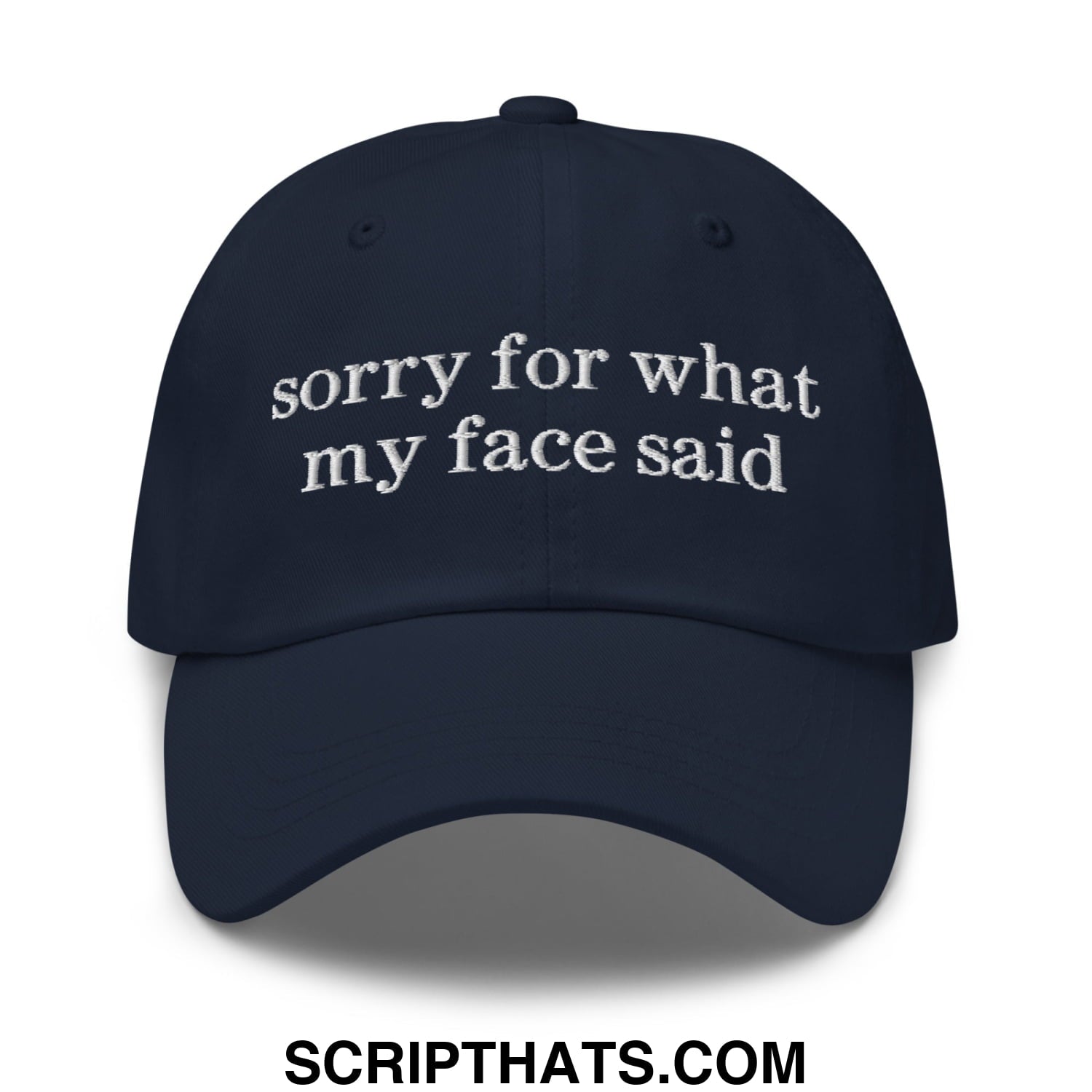 Dark navy embroidered unstructured dad hat with white sorry for what my face said text in casual style