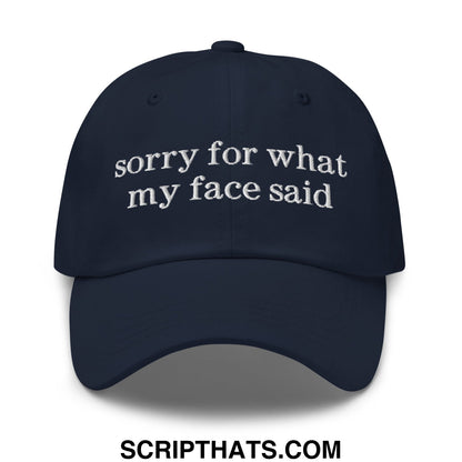 Dark navy embroidered unstructured dad hat with white sorry for what my face said text in casual style