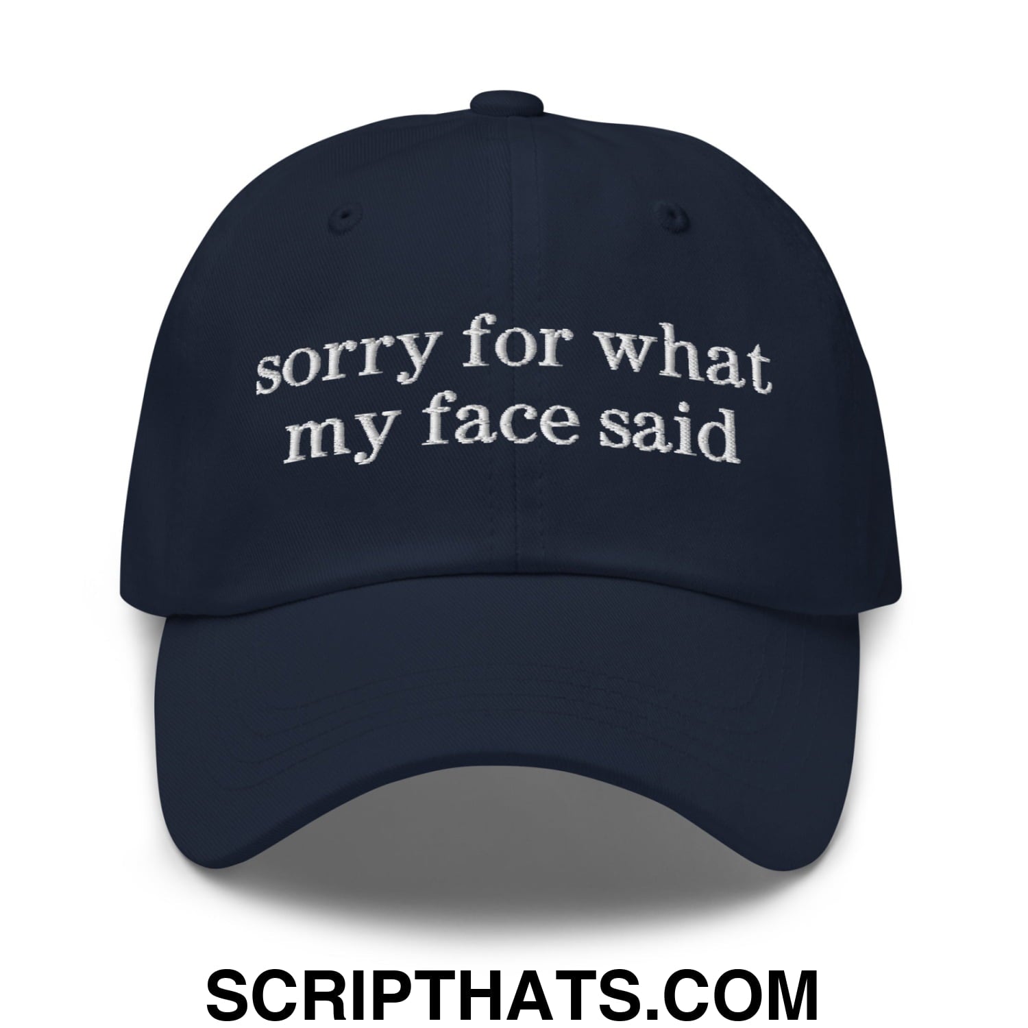 Dark navy embroidered unstructured dad hat with white sorry for what my face said text in casual style
