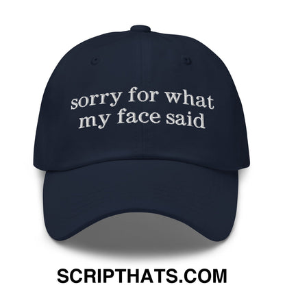 Dark navy embroidered unstructured dad hat with white sorry for what my face said text in casual style