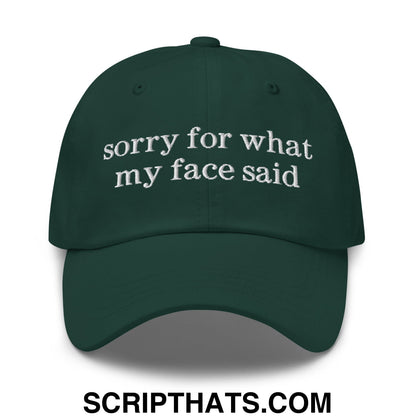 Dark green embroidered unstructured dad hat with white sorry for what my face said text on front panel