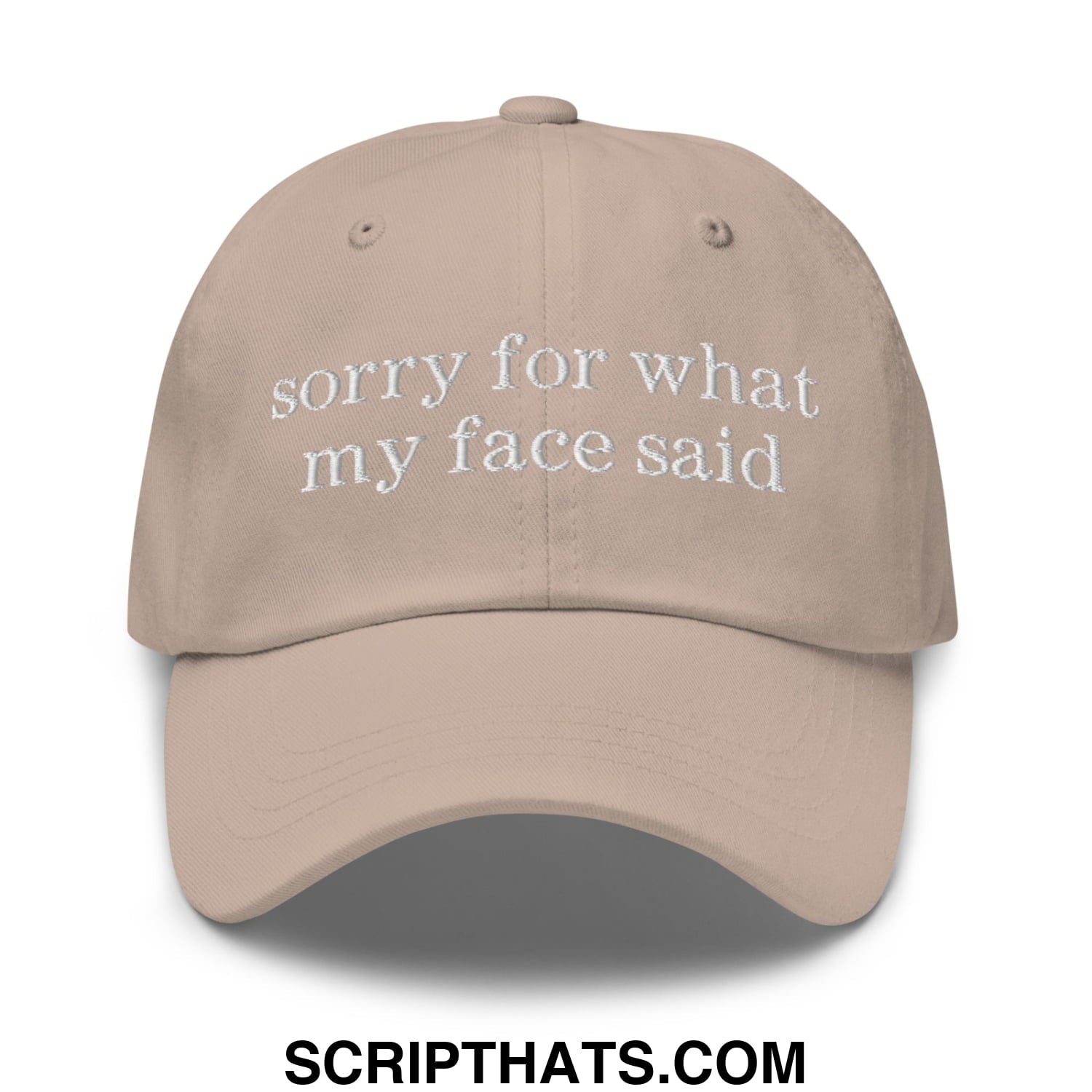 Beige unstructured dad hat with white embroidered sorry for what my face said text on the front