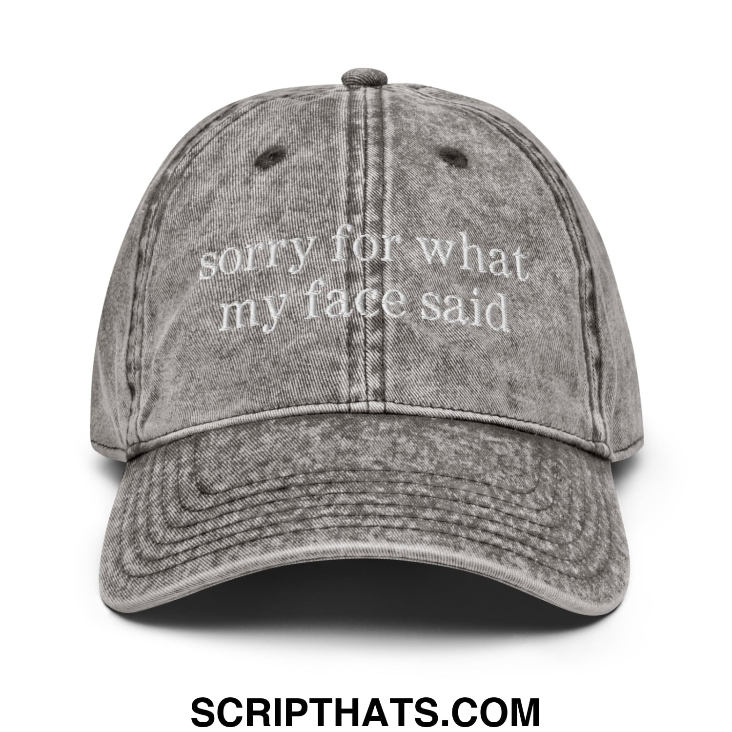 A faded gray denim dad hat with white embroidered sorry for what my face said text unstructured design